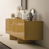 Arrow sideboard with 2 doors, drawers and central basket. Cuscuma lacquered colours.