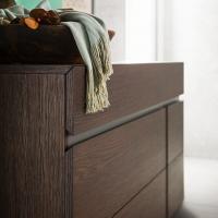 Detail of drawers with grip profile and 45° cut edge