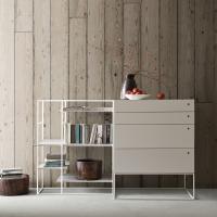 Jess high chest with metal base, next to Crosser bookcase from the same collection