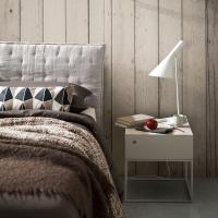 Jess bedside table with white metal base, next to Marlin bed from the same collection