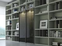 Aliant p.32 modular bookcase with doors, with bar cabinet compartment attesting to its versatility