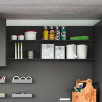 Wide shelf made of metal and matched with the convenient object holders