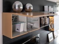 Detail of the folding upwards wall unit with dividing vertical alement and glass shelves