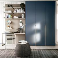 Wide desk with drawers, wall units and Focus wardrobe from the same collection