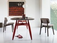 Harriet modern chair with wooden frame and upholstered seat and backrests