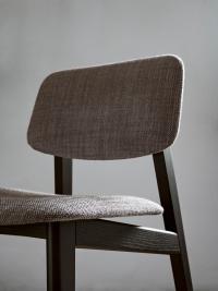 Detail of the upholstered seat and backrest covered in fabric