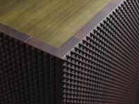Fado cupboard, details of the pyramid-like pattern on the fronts; here is in heat-reated solid wood with bronze top