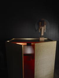 Fado cupboard in Golden Leaf finish. The colour of the inside can be chosen among black, white and red