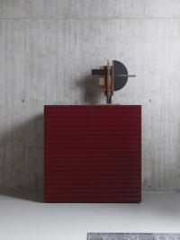 Fado cupboard with a 3D linear pattern on red matt lacquered doors