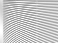 Details of the linear pattern on doors and sides of Fado cupboard, lacquered in white
