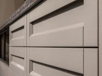 Detail of the drawers with framed front and integrated recess handle
