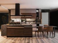 Nine 02 is an eat-in kitchen with central island and integrated table to the cooking area