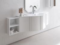 Curved Atlantic gloss white lacquered bathroom cabinet, complemented by other elements from the Atlantic collection