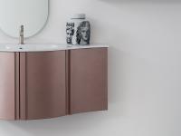 Atlantic curved bathroom cabinet end unit with Versus console basin continuing from the washbasin base unit