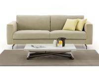Bento coffee table placed in front of a sofa, it can be adjusted in height by the millimetre
