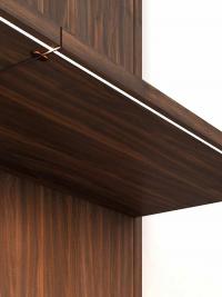 Wooden shelf fitted with horizontal LED bar