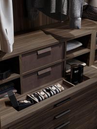 Elegant arrangement of cubby storage above drawer and storage compartment-emptying tray