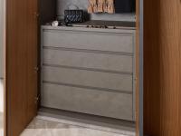 Chest of four drawers with lower basket and upper pocket emptier