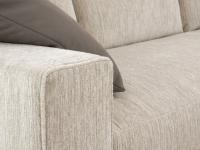 Close up of the sofa with a 20 cm square armrest in col.30 Fabian fabric with matching trim