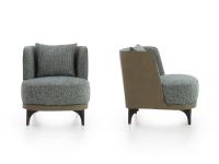 Amanda armchair seen from the front and side, with two-tone upholstery in faux leather and fabric
