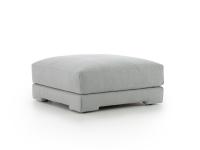 Clive low square ottoman covered in grey fabric