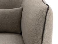Detail of the soft, enveloping shapes of the armrests