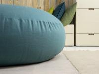 Round ottoman filled with polyesterene fibre