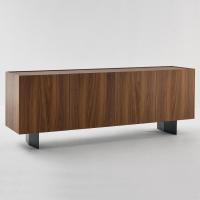 Outline sideboard with high feet in a romboidal shape in painted metal or in a burnished metal