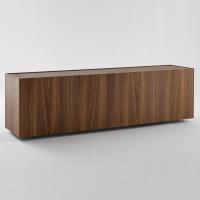 Minimal sideboard with low feet manufactured in a Canaletto walnut finish