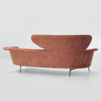 Detail of the back of lovy sofa - slightly curved to enhance conversation
