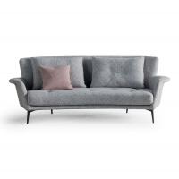 Frontal view of Lovy sofa by Bonaldo in the model with tall back