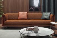 Saddle sofa by Bonaldo with leather outer insert and shaped feet