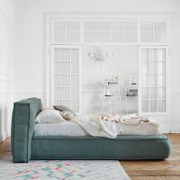 Fluff upholstered bed by Bonaldo with storage box and simple lift-up system