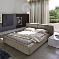 Fluff is a soft, down-padded bed by Bonaldo covered in leather, faux leather or leather