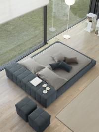 Squaring bed by Bonaldo with a back peninsula and ottomans from the same collection
