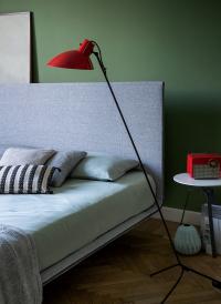 Thin bed by Bonaldo with smooth fabric headboard
