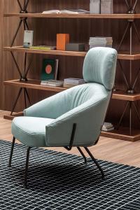 Armchair Bahia by Bonaldo with industrial design structure in painted metal and cosy headrest 