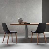 Upholstered chair with wooden legs By by Bonaldo