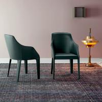 Lamina chair with armrests of visual impact that make it perfect for a conference room or a classic living room and adding a modern twist