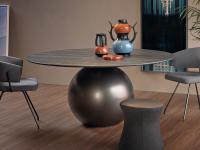 Circus table with ceramic stone top and metal base