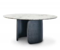 Mellow round table by Bonaldo with central base composed of 2 curved polyurethane slabs