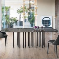 Mille table by Bonaldo with multiple cylindrical legs