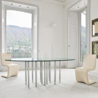 Mille table with many cylindrical legs by Bonaldo in the elliptical version