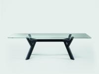 Rectangular Larkin dining table with black oak base and clear glass top with rounded edges