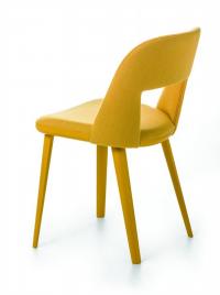 Chair Vence with seat covered in fabric matching with the RAL lacquered finished legs