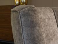 Detail of the high back of the Diva armchair by Borzalino