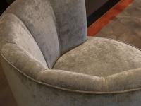 Detail of the upholstered shell-shaped backrest of the Diva armchair by Borzalino