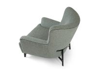The Harmony armchair with soft forms, embellished by a Grosgrain ribbon
