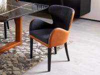 Elekra dining chair in Tuscania 20 leather and St. Moritz 162 fabric