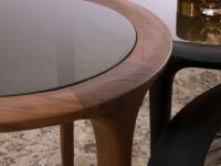 Detail of Godot coffee table in walnut with Golden Mesh Smoky glass top